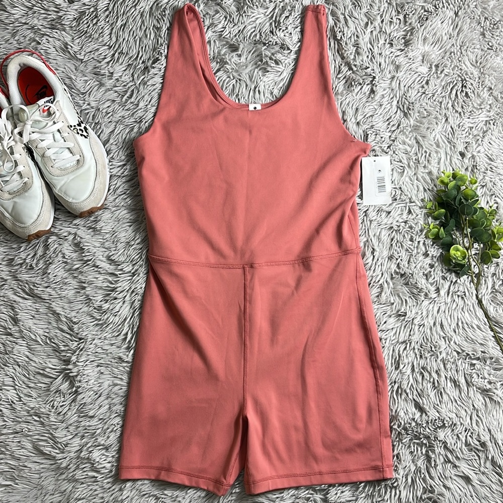 NWT YOGALICIOUS Lux Core Endurance Romper in Brock dust coral size L
